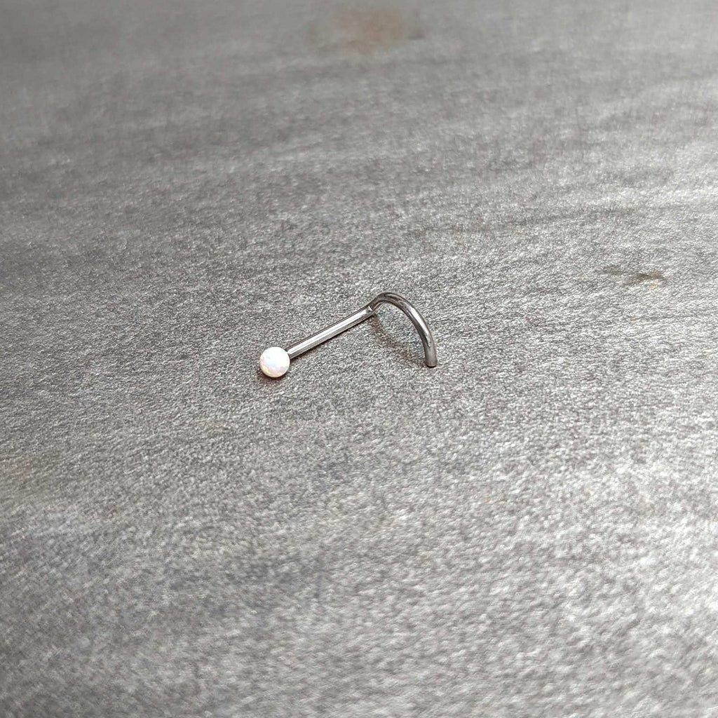20G 1/4 White Synth Opal G23 Titanium Threadless Left Nose Screw