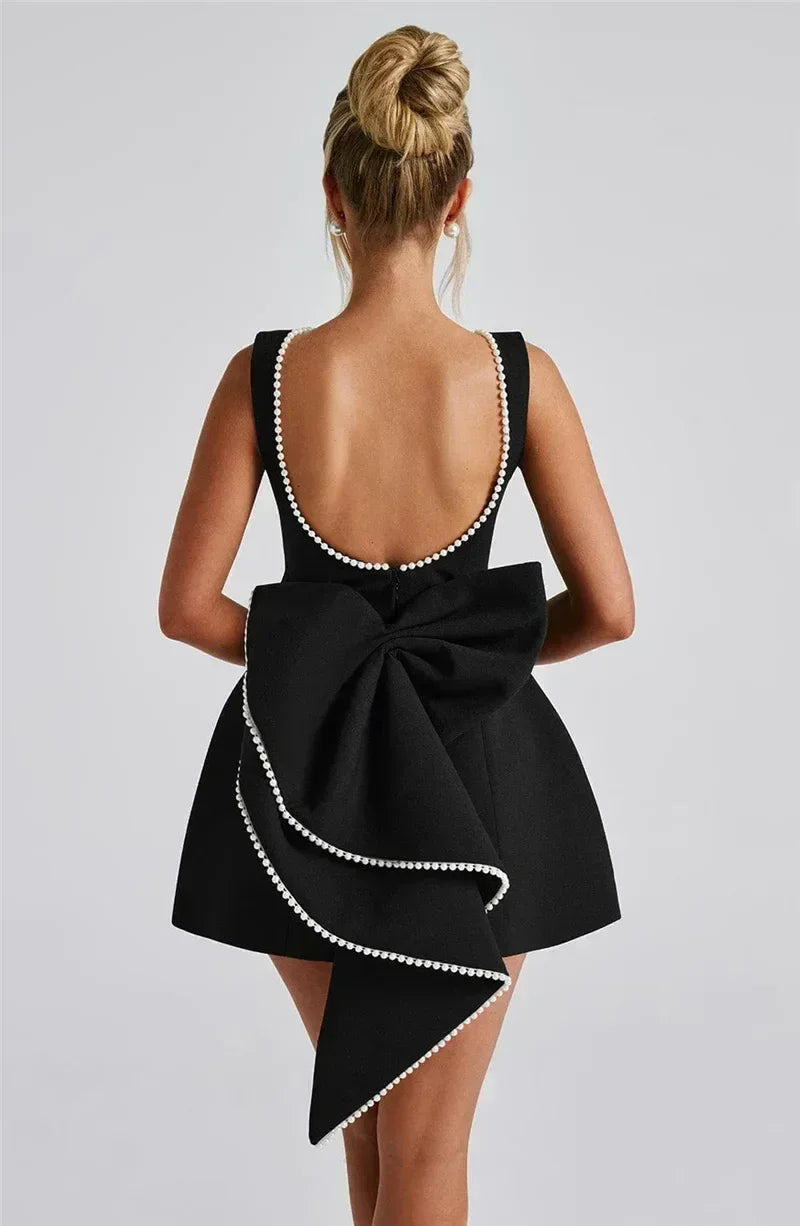 Mozision Pearl Bow Backless Sexy Mini Dress For Women Robe Fashion Zipper Sleeveless High Waist A-line Club Party Dress Elegant